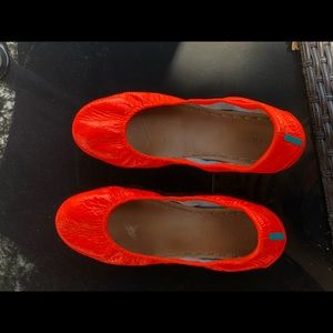 Outrageous Orange Tieks, size 11